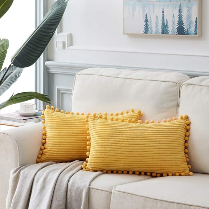 Fancy Homi Pack of 2 Boho Lumbar Decorative Throw Pillow Covers with Pom-poms, Soft Corduroy Solid Rectangle Cushion Cases Set for Couch Sofa Bedroom Car Living Room (12x24 Inch/30x60 cm, Yellow)