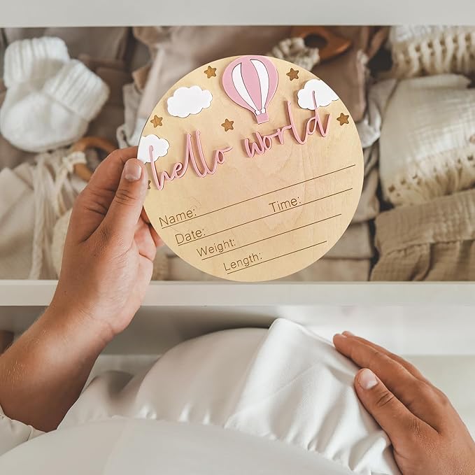 Hello World Newborn Sign - 5.9” Round Wooden Baby Announcement Sign with 3D Hot Air Balloon, Clouds & Stars - Keepsake Birth Gift for Baby Girl’s First Day, Hospital, Shower, or Nursery Décor (Pink)