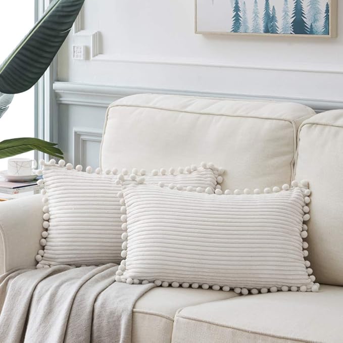 Fancy Homi 2 packs Cream White Boho Decorative Throw Pillow Covers with Pom-poms, Soft Corduroy Solid Square Cushion Cases Set for Living Room Couch Sofa Bedroom Car (14x24 Inch/35x60 cm, Cream White)