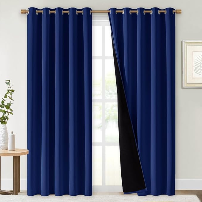 NICETOWN 100% Blackout Window Curtain Panels, Royal Blue, 2 PCs, 62" Wide Each Panel, Cold and Full Light Blocking Drapes with Black Liner for Nursery, 84 inches Drop Thermal Insulated Draperies