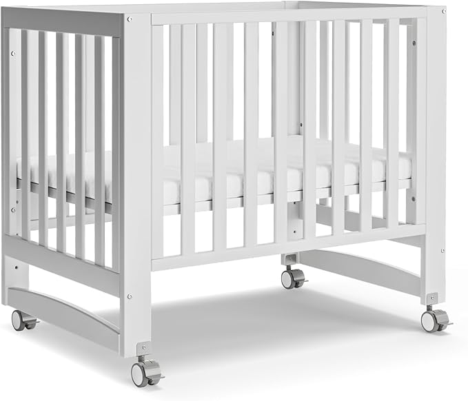 MAMAZING EvoNest Baby Crib, 6 in 1 Convertible Mini Crib with Wheels, 100% New Zealand Wood Growing Bed, 4 Adjustable Mattress Height, GREENGUARD Gold Certified, White