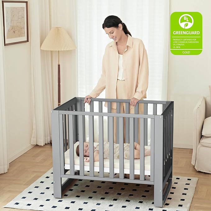 MAMAZING EvoNest Baby Crib, 6 in 1 Convertible Mini Crib with Wheels, 100% New Zealand Wood Growing Bed, 4 Adjustable Mattress Height, GREENGUARD Gold Certified, Grey