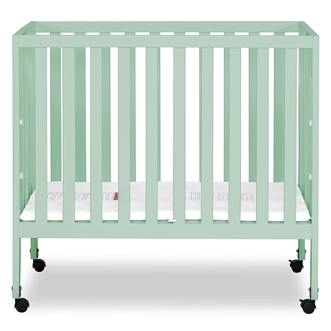 Dream On Me Jett Mini Folding Baby Crib in Mint, GreenGuard Gold & JPMA, Lightweight & Portable, Patented Flat Folding System for Small Spaces & Travel, 1.5” Mattress Pad, 3 Heights, Safe Wheels