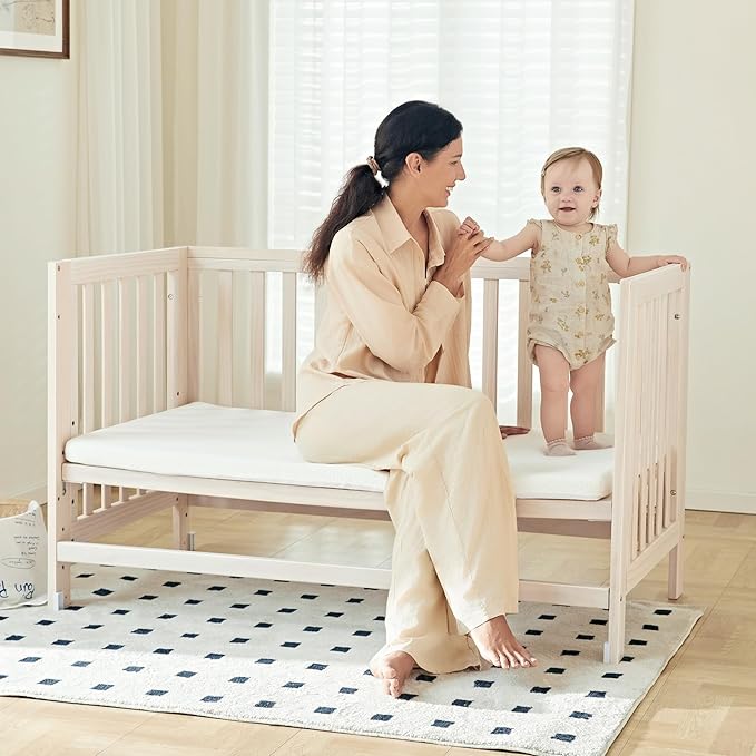 MAMAZING EvoNest Baby Crib, 11 in 1 Convertible Crib with Wheels, 100% New Zealand Wood Growing Bed, 4 Adjustable Mattress Height,Washed Natural