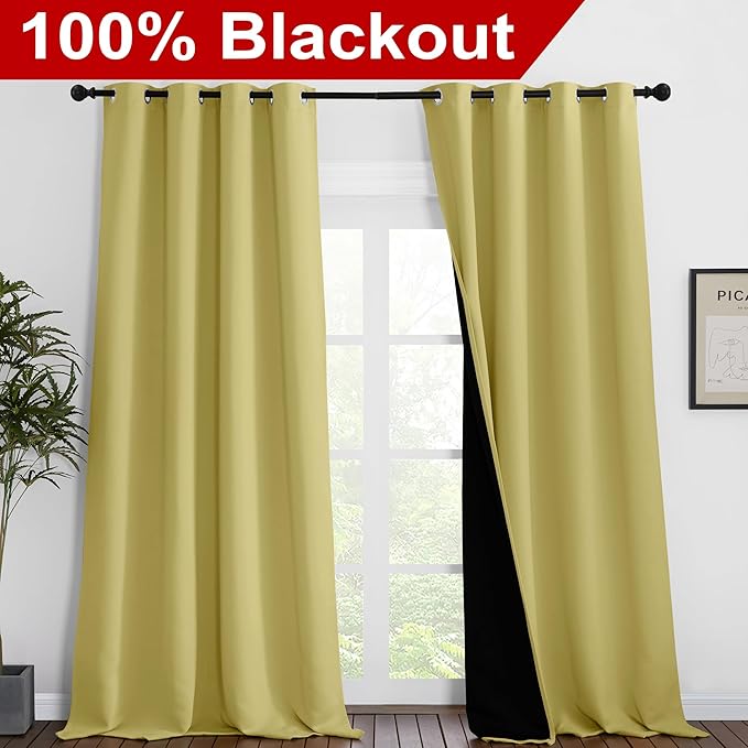 NICETOWN Total Shade Curtains and Draperies, Heavy-Duty Full Light Shading Drapes with Black Liner Backing for Villa/Hall/Dorm Window(Paler Yellow, Package of 2 Panels, 52 inches Wide x 95 inches Long
