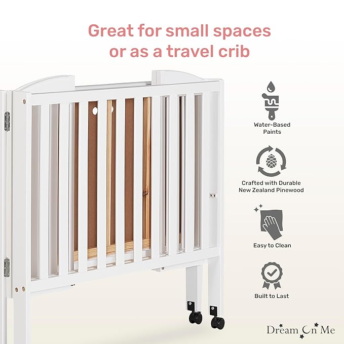 Dream On Me 2-in-1 Folding Portable Compact Mini Baby Crib in White, GreenGuard Gold & JPMA, US Patented Flat Folding System, Locking Wheels, 1″ Mattress Pad, Space-Saving Quck Fold Easy Storage