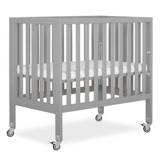 Dream On Me Jett Mini Folding Baby Crib in Pebble Grey, GreenGuard Gold & JPMA, Lightweight & Portable, Patented Flat Folding System, Small Spaces & Travel, 1.5” Mattress Pad, 3 Heights, Safe Wheels
