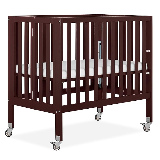 Dream On Me Jett Mini Folding Baby Crib in Espresso, GreenGuard Gold & JPMA, Lightweight & Portable, Patented Flat Folding System for Small Spaces & Travel, 1.5” Mattress Pad, 3 Heights, Safe Wheels