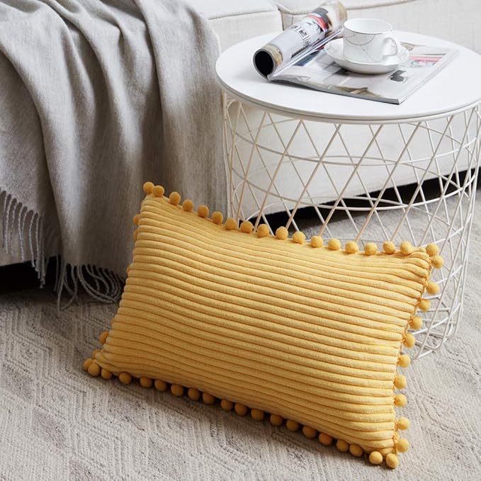 Fancy Homi Pack of 2 Boho Lumbar Decorative Throw Pillow Covers with Pom-poms, Soft Corduroy Solid Rectangle Cushion Cases Set for Couch Sofa Bedroom Car Living Room (12x24 Inch/30x60 cm, Yellow)