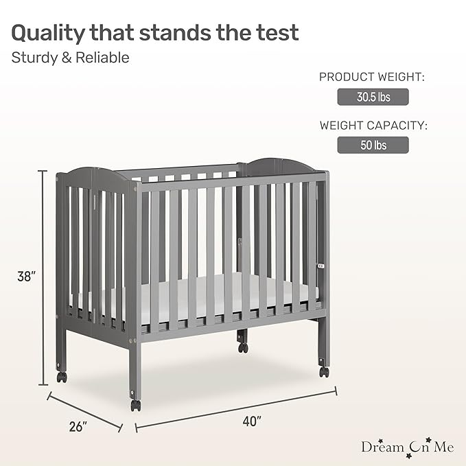 Dream On Me 2-in-1 Folding Portable Compact Mini Baby Crib in Steel Grey, GreenGuard Gold & JPMA, US Patented Flat Folding System, Locking Wheels, 1″ Mattress Pad, Space-Saving Quck Fold Easy Storage