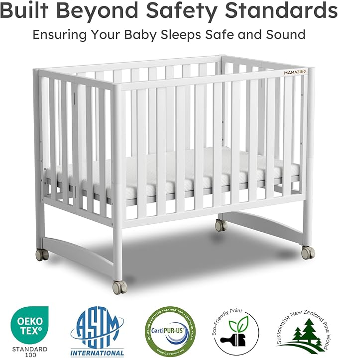 MAMAZING EvoNook 6-in-1 Convertible Mini Crib, 100% New Zealand Solid Wood, 4 Adjustable Mattress Heights, Crib with Mattress, GREENGUARD Gold Certified,White