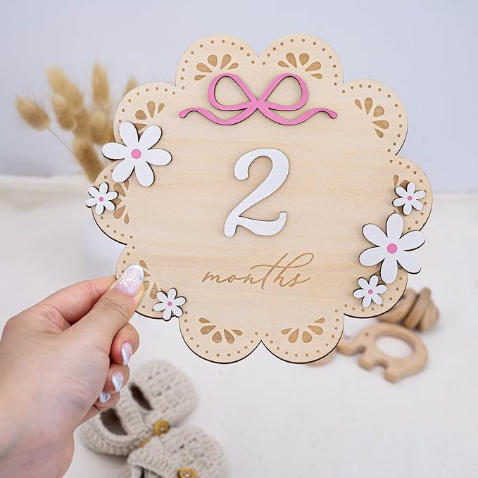 Baby Monthly Milestone Photo Sign, Wooden Floral Design with Pink Bows, Baby Girl Growth Tracker, 1-12 Months (Natural Wood and White with Pink Accents)