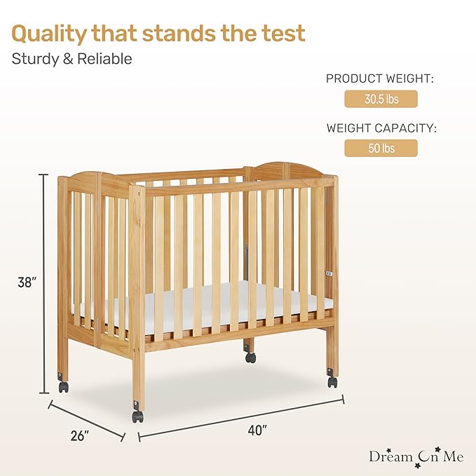 Dream On Me 2-in-1 Folding Portable Compact Mini Baby Crib in Natural, GreenGuard Gold & JPMA, US Patented Flat Folding System, Locking Wheels, 1″ Mattress Pad, Space-Saving Quick Fold Easy Storage
