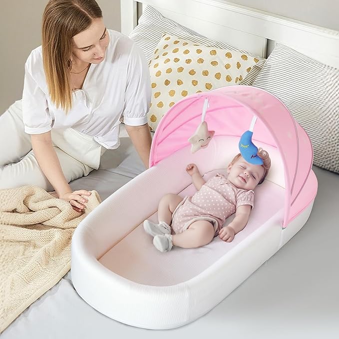 Portable Newborn Nest Lounger-Travel Bassinet,with Canopy & Mosquito Net-Lightweight Foldable Lounger Cotton Cover & Supportive Mattress Washable and Indoor-Outdoor Use (Pink)