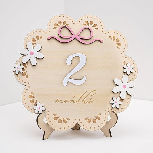 Baby Monthly Milestone Photo Sign, Wooden Floral Design with Pink Bows, Baby Girl Growth Tracker, 1-12 Months (Natural Wood and White with Pink Accents)