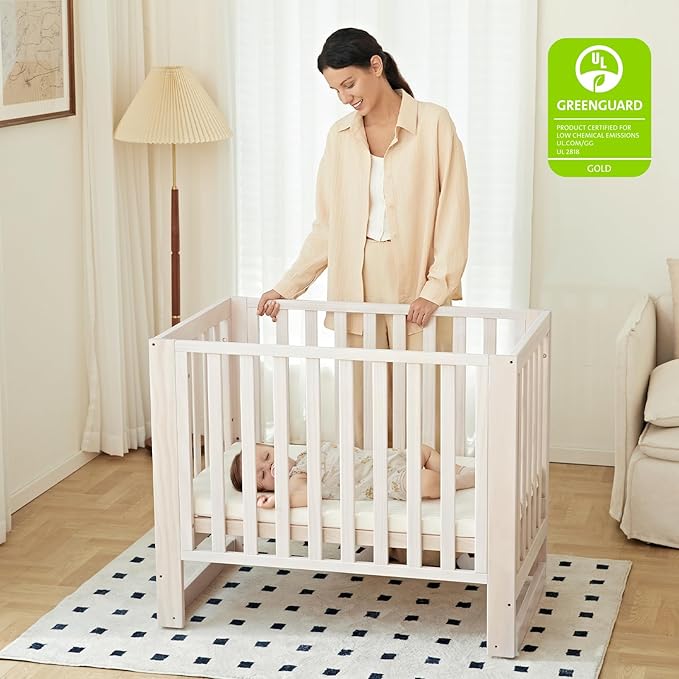 MAMAZING EvoNest Baby Crib, 6 in 1 Convertible Mini Crib with Wheels, 100% New Zealand Wood Growing Bed, 4 Adjustable Mattress Height, GREENGUARD Gold Certified, Wahsed Natural