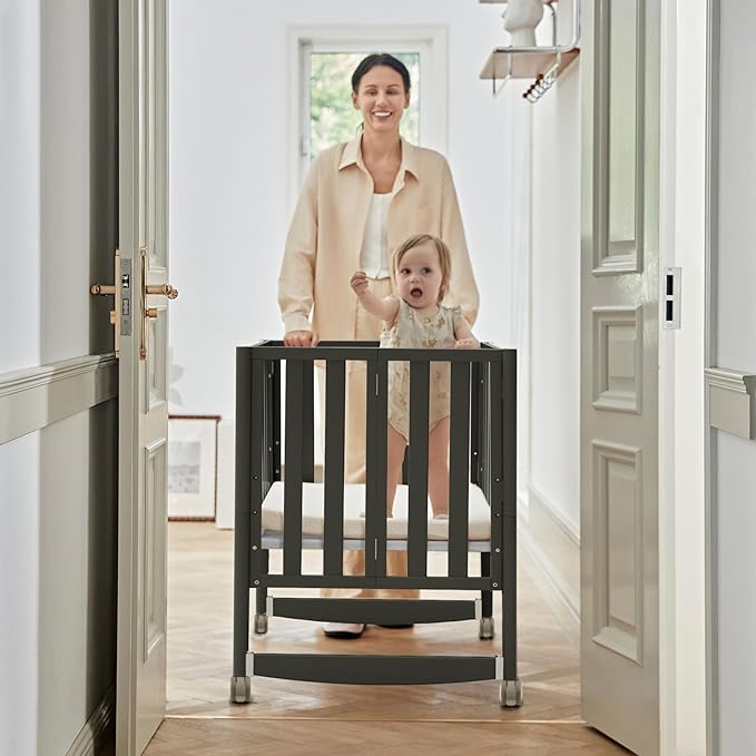 MAMAZING EvoNook 6-in-1 Convertible Mini Crib, 100% New Zealand Pinewood, 4 Adjustable Mattress Heights,GREENGUARD Gold Certified, Black with Matttress
