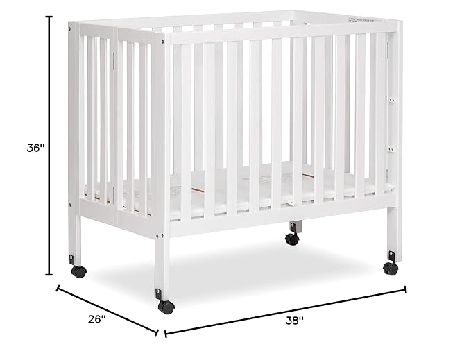 Dream On Me Jett Mini Folding Baby Crib in White, GreenGuard Gold & JPMA, Lightweight & Portable, Patented Flat Folding System for Small Spaces & Travel, 1.5” Mattress Pad, 3 Heights, Safe Wheels