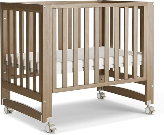 MAMAZING EvoNest Baby Crib, 6 in 1 Convertible Mini Crib with Wheels, 100% New Zealand Pinewood Growing Bed, 4 Adjustable Mattress Height,GREENGUARD Gold Certified,Brown