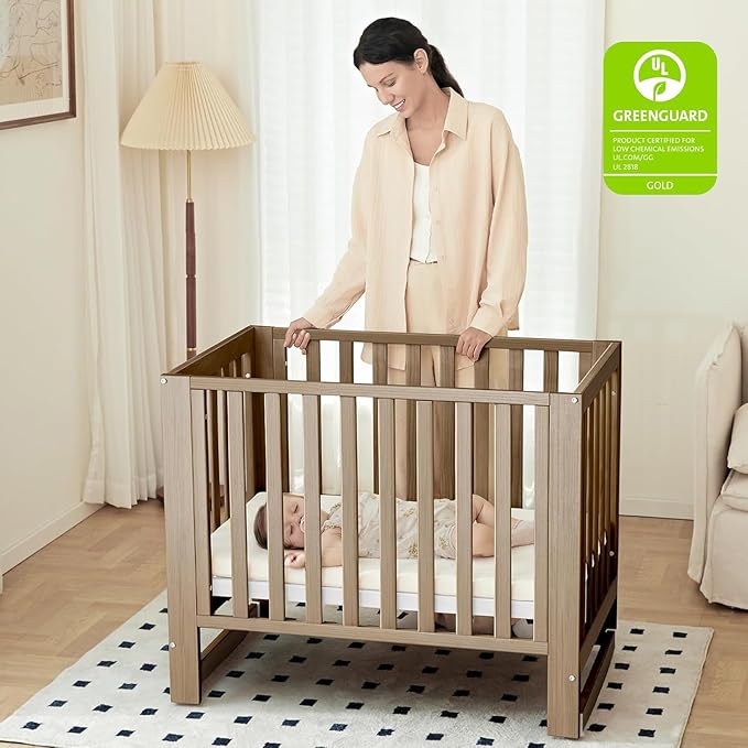 MAMAZING EvoNest Baby Crib, 6 in 1 Convertible Mini Crib with Wheels, 100% New Zealand Pinewood Growing Bed, 4 Adjustable Mattress Height,GREENGUARD Gold Certified,Brown