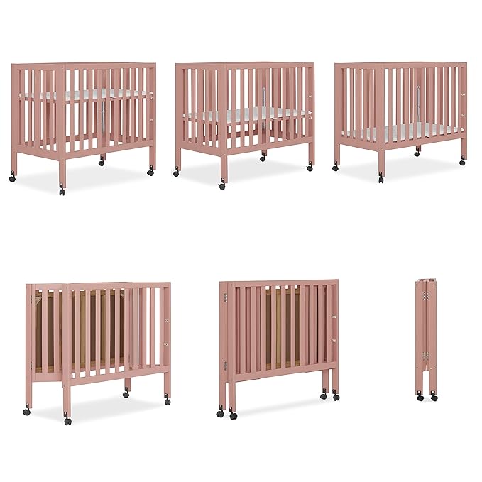 Dream On Me Jett Mini Folding Baby Crib in Dusty Pink, GreenGuard Gold & JPMA, Lightweight & Portable, Patented Flat Folding System for Small Spaces & Travel, 1.5” Mattress Pad, 3 Heights, Safe Wheels
