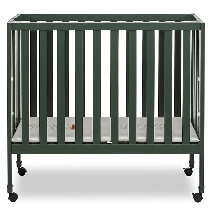 Dream On Me Jett Mini Folding Baby Crib in Olive, GreenGuard Gold & JPMA, Lightweight & Portable, Patented Flat Folding System for Small Spaces & Travel, 1.5” Mattress Pad, 3 Heights, Safe Wheels
