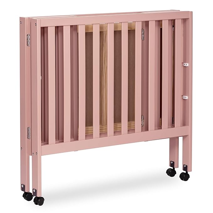 Dream On Me Jett Mini Folding Baby Crib in Dusty Pink, GreenGuard Gold & JPMA, Lightweight & Portable, Patented Flat Folding System for Small Spaces & Travel, 1.5” Mattress Pad, 3 Heights, Safe Wheels