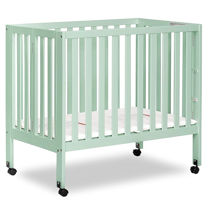 Dream On Me Jett Mini Folding Baby Crib in Mint, GreenGuard Gold & JPMA, Lightweight & Portable, Patented Flat Folding System for Small Spaces & Travel, 1.5” Mattress Pad, 3 Heights, Safe Wheels