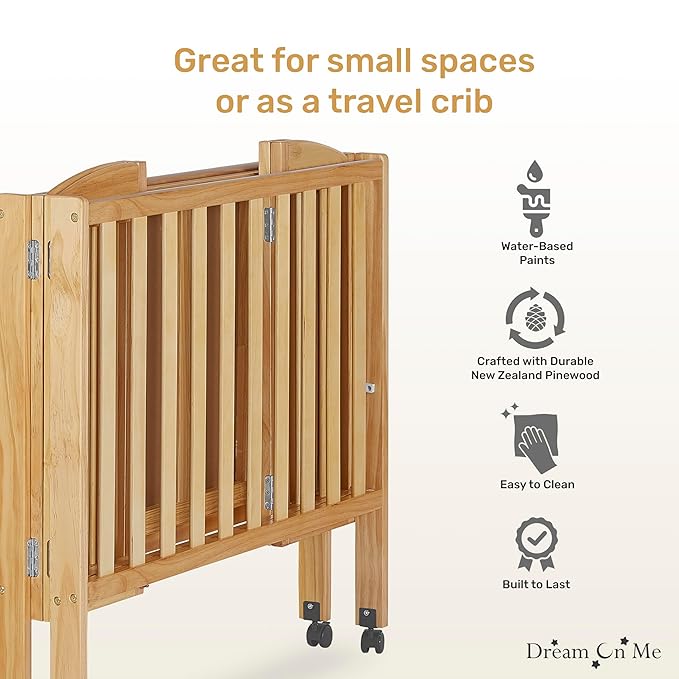 Dream On Me 2-in-1 Folding Portable Compact Mini Baby Crib in Natural, GreenGuard Gold & JPMA, US Patented Flat Folding System, Locking Wheels, 1″ Mattress Pad, Space-Saving Quick Fold Easy Storage