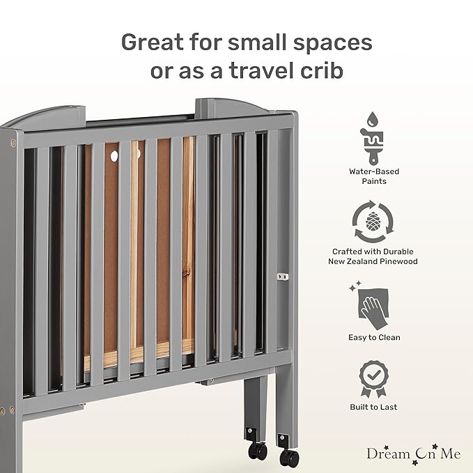 Dream On Me 2-in-1 Folding Portable Compact Mini Baby Crib in Steel Grey, GreenGuard Gold & JPMA, US Patented Flat Folding System, Locking Wheels, 1″ Mattress Pad, Space-Saving Quck Fold Easy Storage
