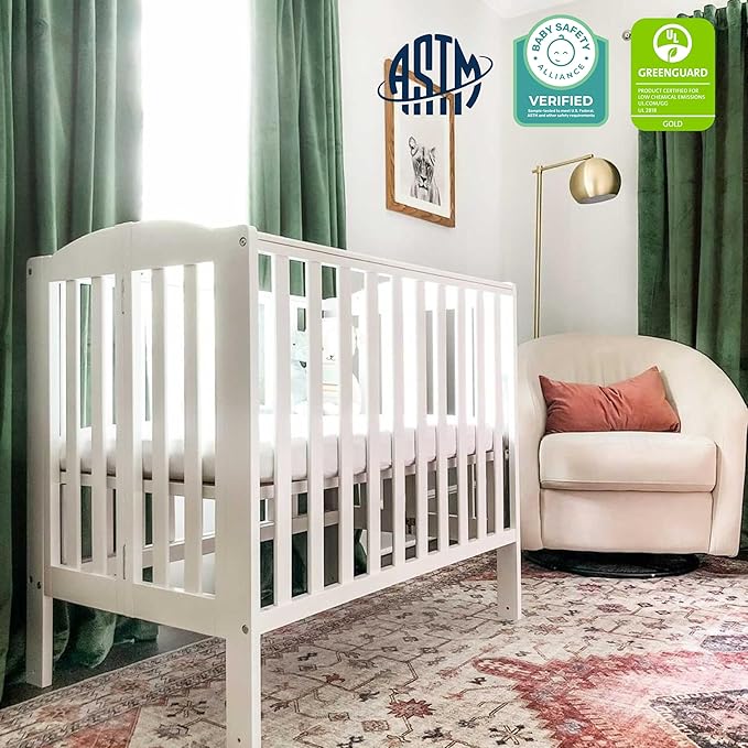 Dream On Me 2-in-1 Folding Portable Compact Mini Baby Crib in White, GreenGuard Gold & JPMA, US Patented Flat Folding System, Locking Wheels, 1″ Mattress Pad, Space-Saving Quck Fold Easy Storage