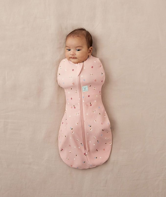 ergoPouch Cocoon Swaddle Sack 1.0 TOG - Baby Sleep Sack, Gentle Snug Fit Helps Calm Startle Reflex, Ideal for Arms In/Out Sleeping, Soft Breathable Fabric for Better Sleep (0 Months, Daisies)