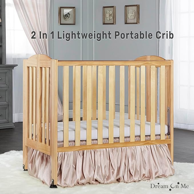 Dream On Me 2-in-1 Folding Portable Compact Mini Baby Crib in Natural, GreenGuard Gold & JPMA, US Patented Flat Folding System, Locking Wheels, 1″ Mattress Pad, Space-Saving Quick Fold Easy Storage