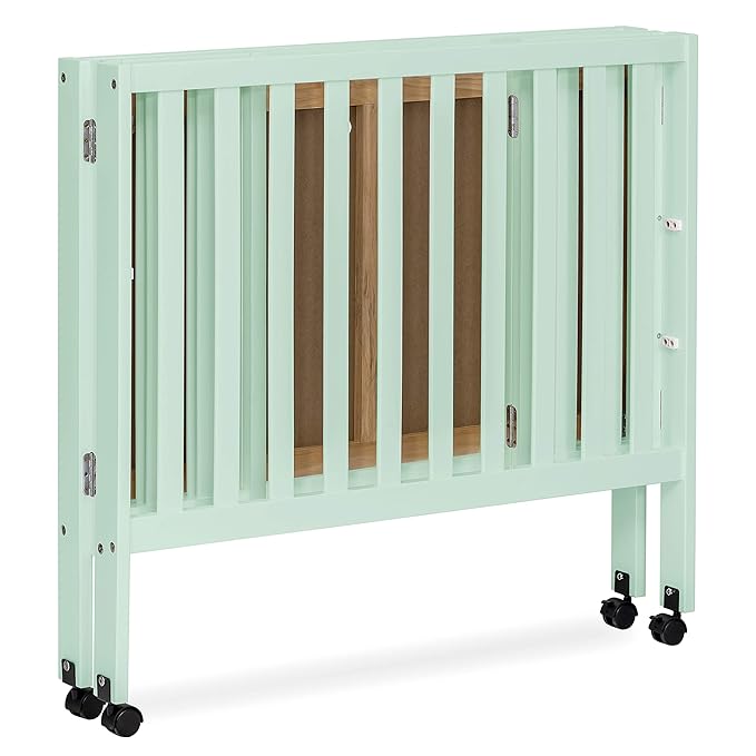 Dream On Me Jett Mini Folding Baby Crib in Mint, GreenGuard Gold & JPMA, Lightweight & Portable, Patented Flat Folding System for Small Spaces & Travel, 1.5” Mattress Pad, 3 Heights, Safe Wheels