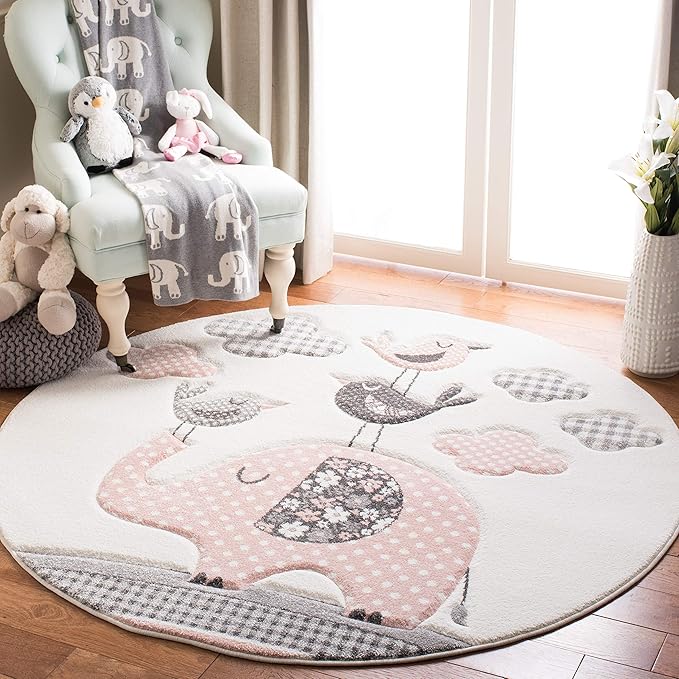 SAFAVIEH Carousel Kids Collection Area Rug - 5'3" Round, Pink & Ivory, Animal Design, Non-Shedding & Easy Care, Ideal for High Traffic Areas for Boys & Girls in Playroom, Nursery, Bedroom (CRK127P)