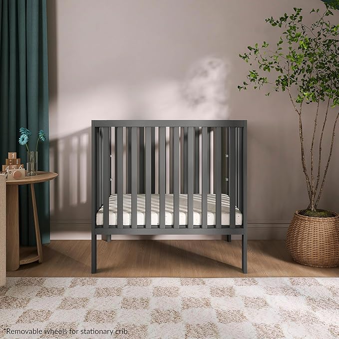 Dream On Me Jett Mini Folding Baby Crib in Pebble Grey, GreenGuard Gold & JPMA, Lightweight & Portable, Patented Flat Folding System, Small Spaces & Travel, 1.5” Mattress Pad, 3 Heights, Safe Wheels