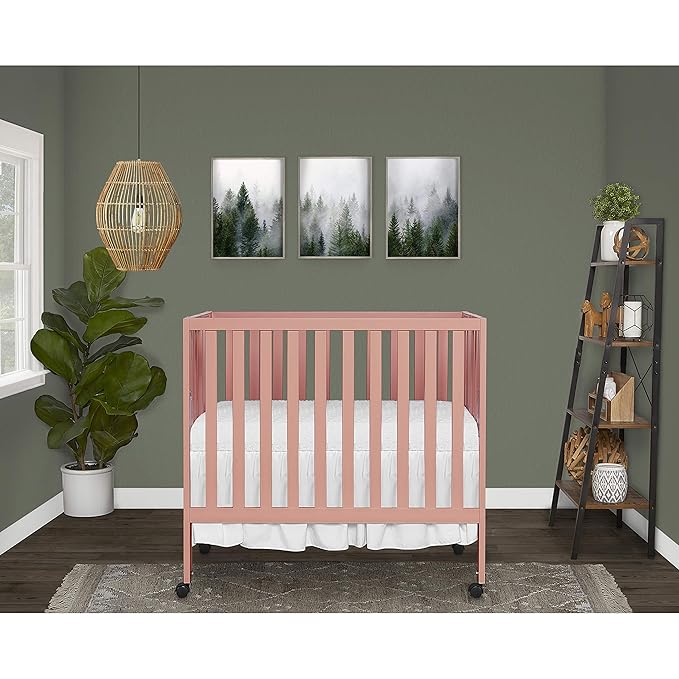 Dream On Me Jett Mini Folding Baby Crib in Dusty Pink, GreenGuard Gold & JPMA, Lightweight & Portable, Patented Flat Folding System for Small Spaces & Travel, 1.5” Mattress Pad, 3 Heights, Safe Wheels