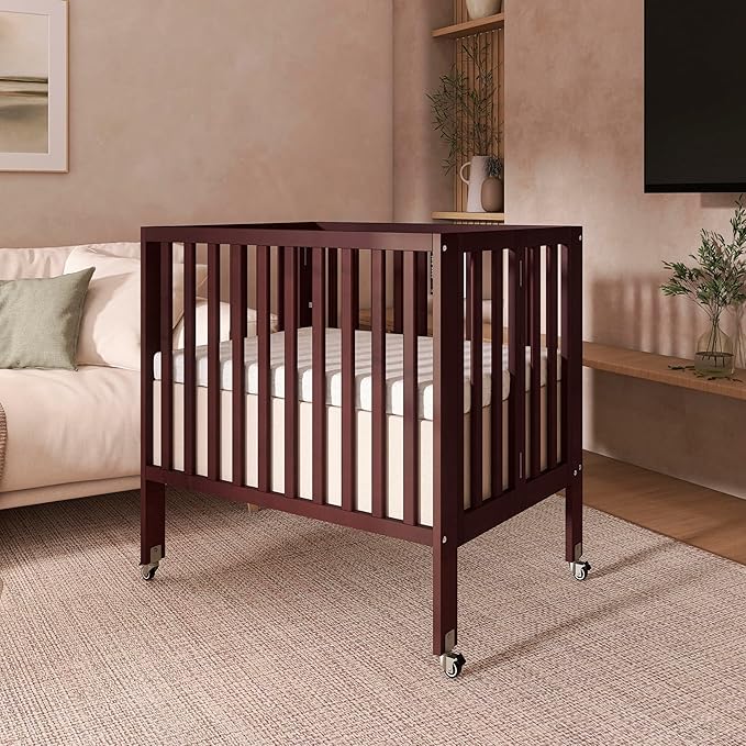 Dream On Me Jett Mini Folding Baby Crib in Espresso, GreenGuard Gold & JPMA, Lightweight & Portable, Patented Flat Folding System for Small Spaces & Travel, 1.5” Mattress Pad, 3 Heights, Safe Wheels
