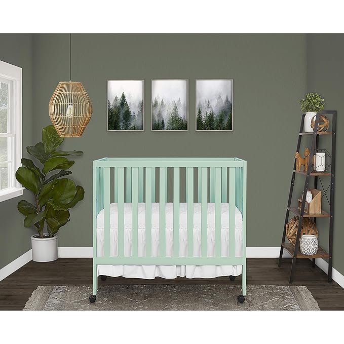 Dream On Me Jett Mini Folding Baby Crib in Mint, GreenGuard Gold & JPMA, Lightweight & Portable, Patented Flat Folding System for Small Spaces & Travel, 1.5” Mattress Pad, 3 Heights, Safe Wheels